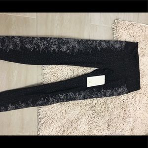 Size 8 brand new Lululemon Wunder Under leggings.